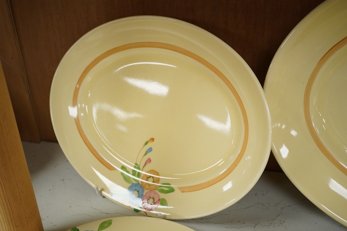 A Clarice Cliff style Newport pottery Biarritz shape part dinner service